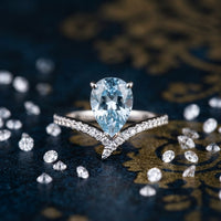 Vintage Pear Cut Light Blue Gemstone V-Shape Solitaire Ring