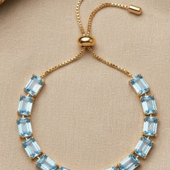 Gold Plated Emerald Cut Light Blue Crystal Tennis Bracelet