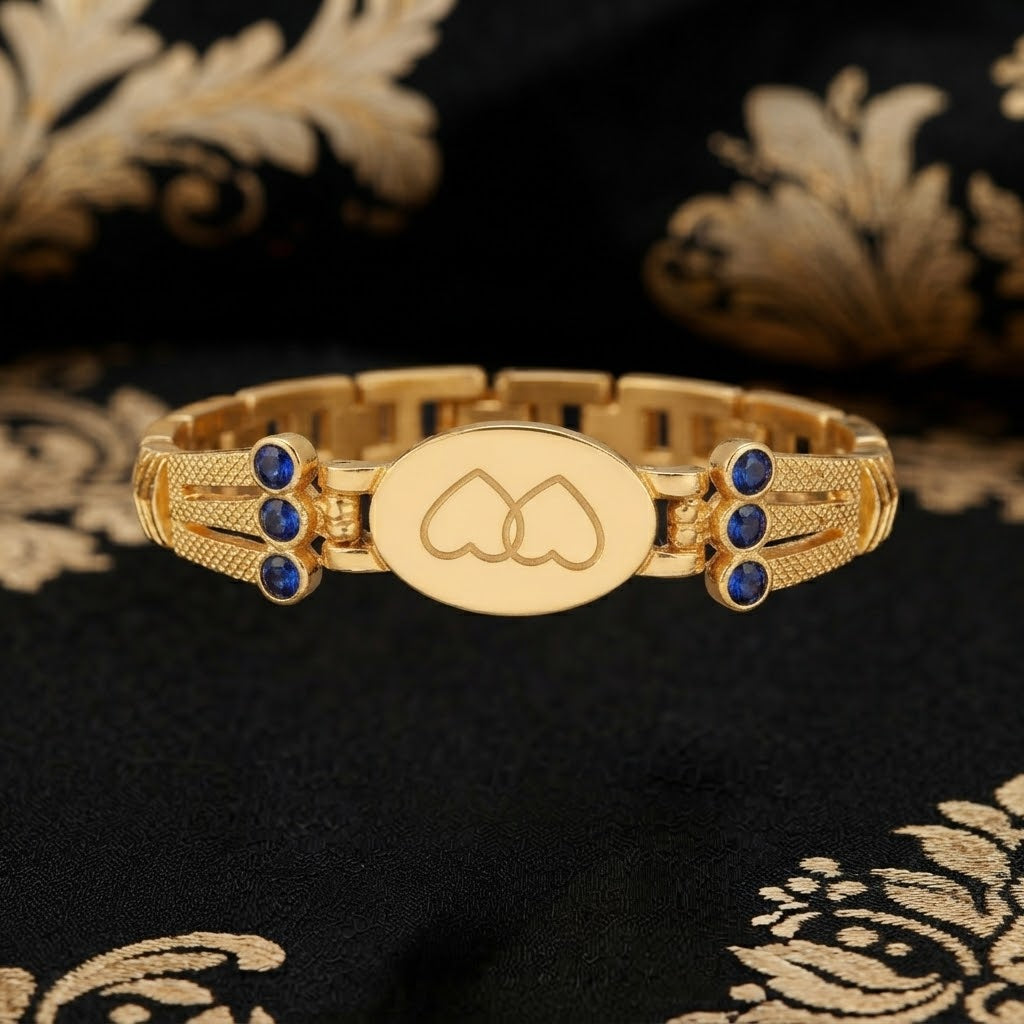 Gold Plated Engraved Heart Link Bracelet with Blue Crystal Accents